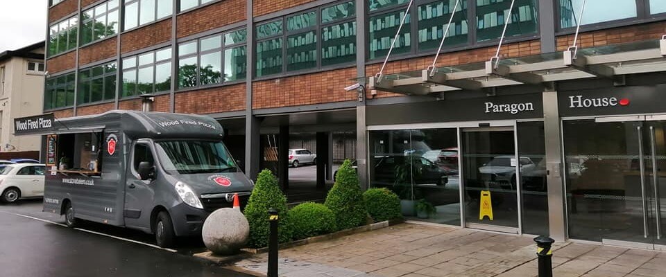 Stonebakers catering a corporate event, parked outside of the office
